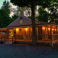 exterior of camp store at night