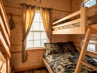 Bunkbeds with stairway and window
