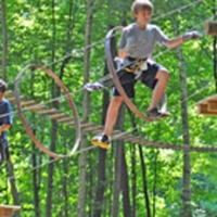 two boys on high wire adventure course