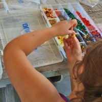 someone making jewelry