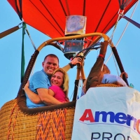 a couple in a hot air balloon
