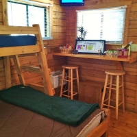 inside of cabin with wine on counter