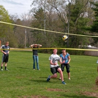 kids playing volleyball in park